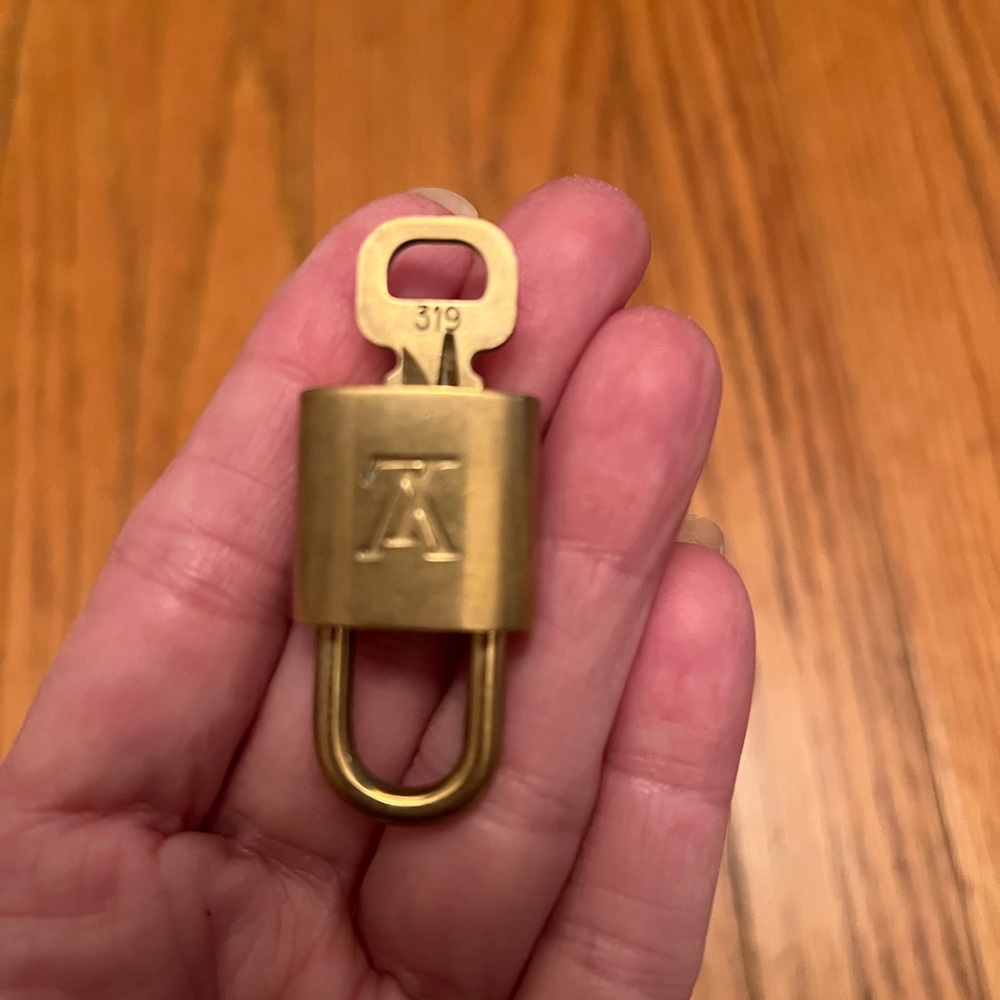 Louis Vuitton Gold Padlock with Key